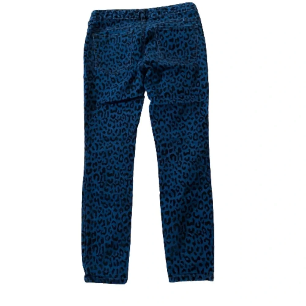 Free People women’s blue cheetah skinny jeans size 27